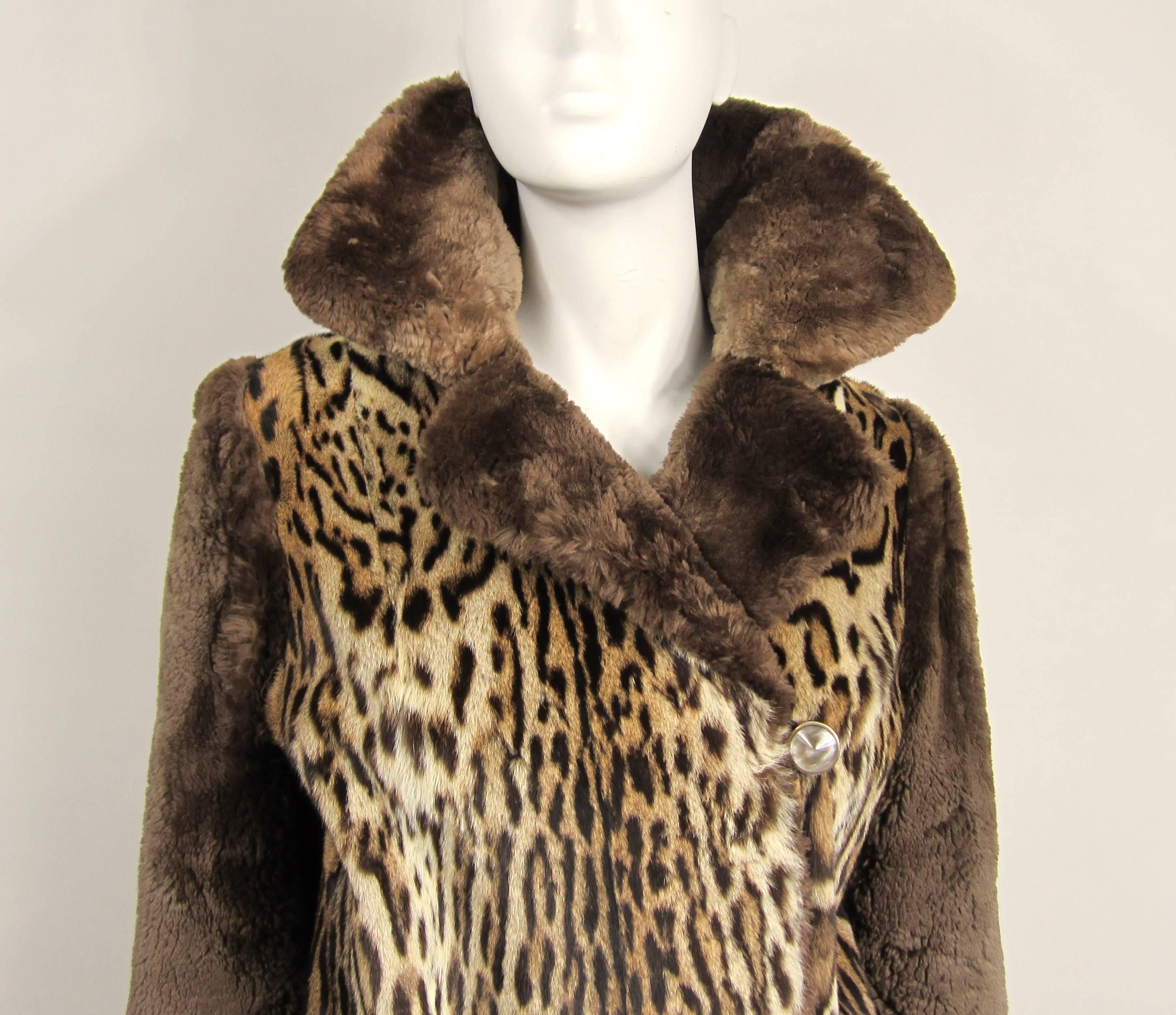 Wow. This is a stunning 1940s two fur jacket By M Blaustein of Short Hills. 2 slit pockets with 4 button closure that extends up to your neck. Monogrammed on the lining. Beige lining. Soft supple fur. Statement piece for sure. Will fit a 4-6 nicely,
