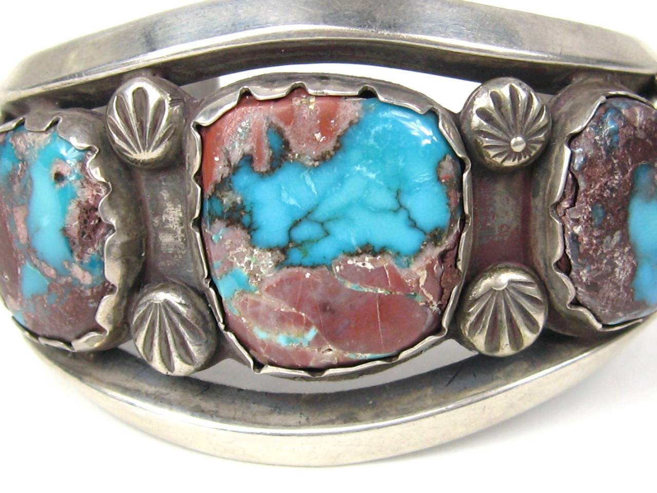 Three stone Turquoise & Brown Matrix Old pawn Cuff. Measure approximately 1.60 in wide down to .70 in. Opening 1.52 in. Will fit a 6.5 to 7.5 wrist Hallmarked on the inside RHY. This is out of a massive collection of Hopi, Zuni, Navajo,