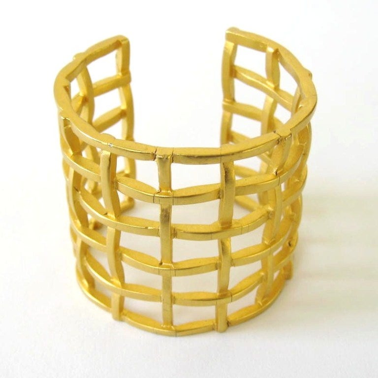 Massive Karl Lagerfeld Gold tone Cuff Bracelet. Nice scale 2.05 wide. This is out of a massive collection of Hopi, Zuni, Navajo, Southwestern, sterling silver, (costume jewelry that was not worn)  and fine jewelry from one collector. Be sure to