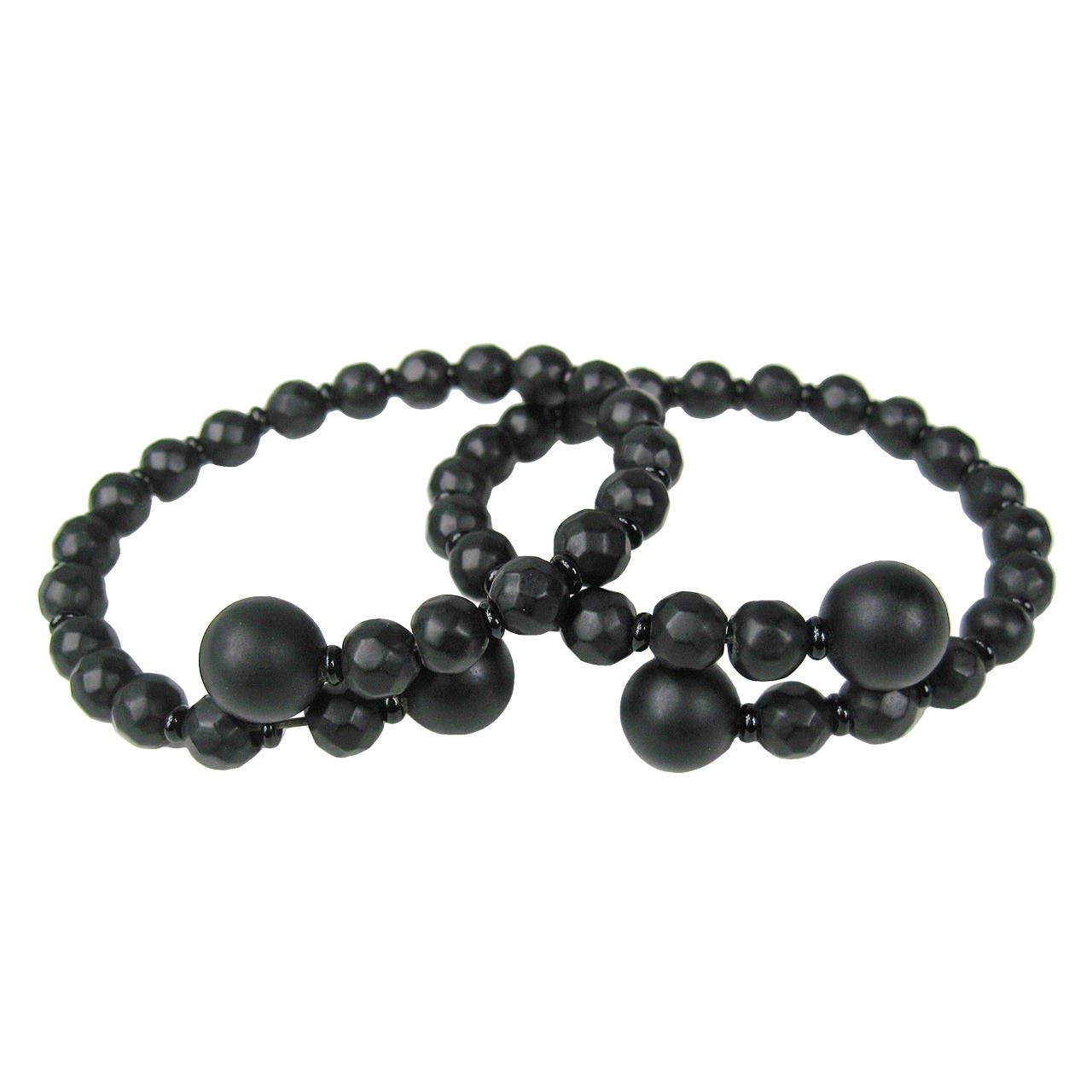 Pair of Early Whitby Jet Coiled Wrap Matching Bracelets MCNY For Sale