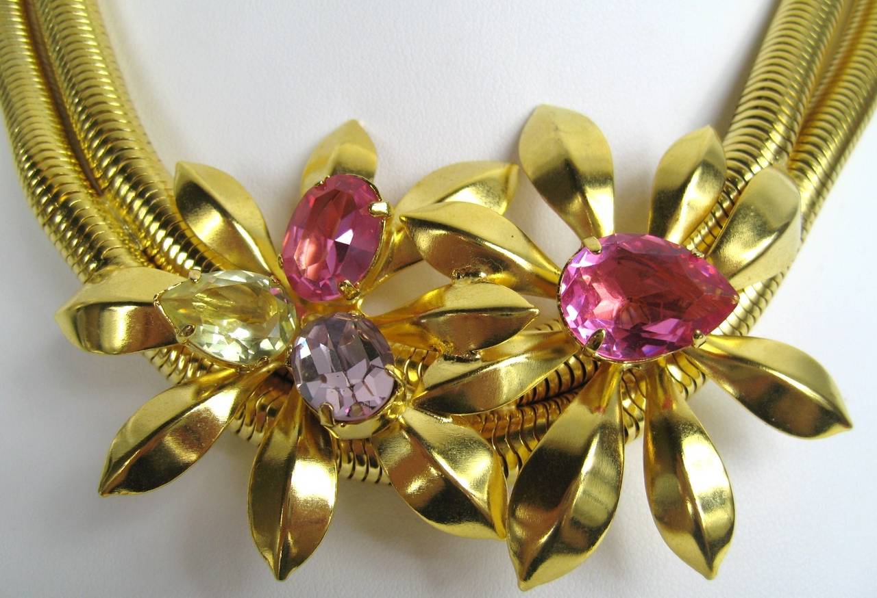 Stunning Philippe Ferrandis Floral Necklace. Purchased in the 90s and never worn. Double Snake chain with 2 large flowers at the base on the necklace. Pinks, Purples prong set crystals made of the colors on this set. 16 inches Long  Necklace.