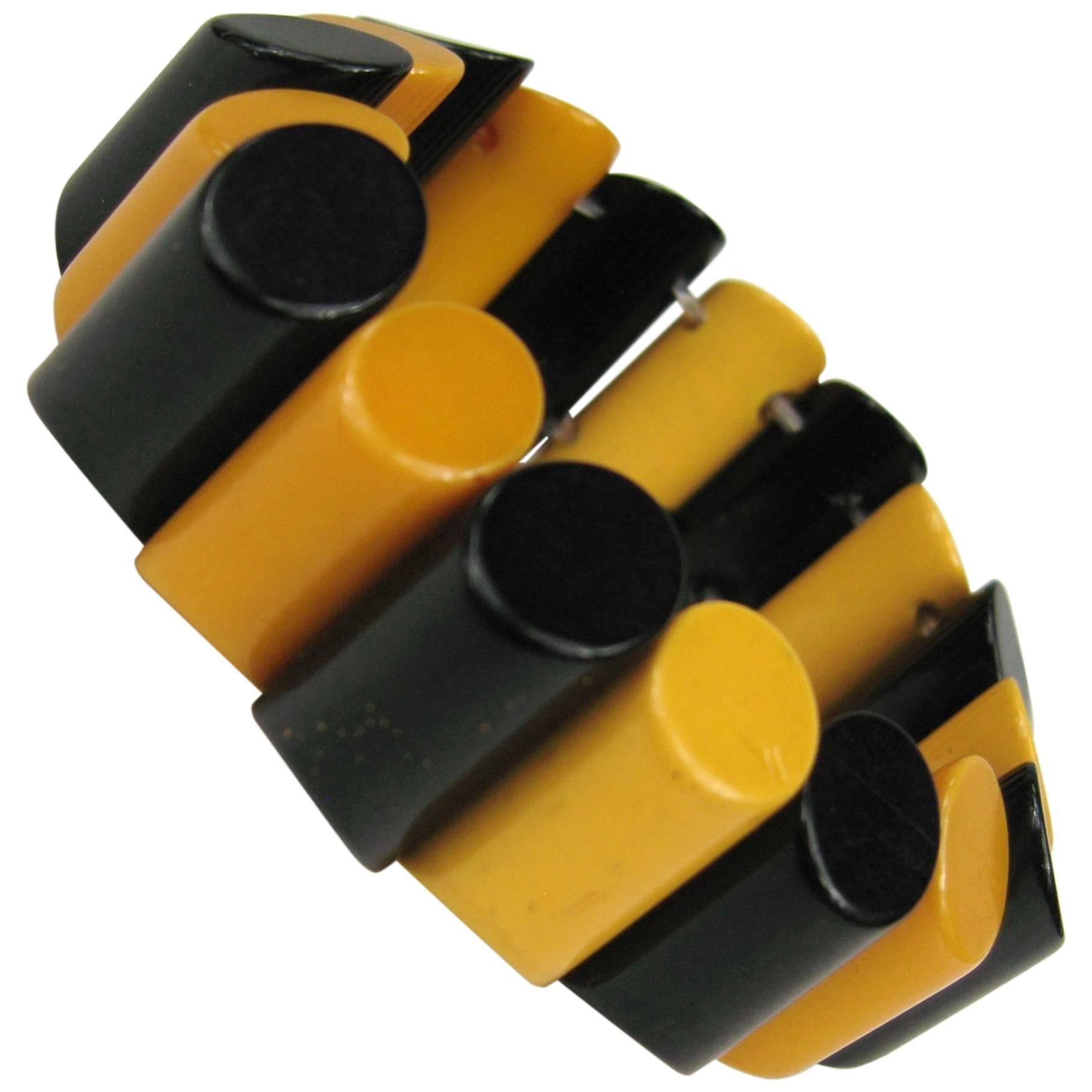 Bracelet Catalin extensible jaune et noir en bakélite, véritable bracelet vintage des années 1930  en vente