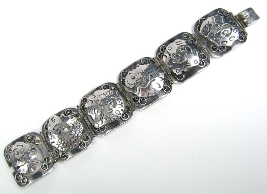 Sterling Silver Mexican Link Bracelet. Slide in clasp. This will fit a 6.5 inch wrist -Links are 1.03 inches wide - Measuring 7 inches end to end. This is out of a massive collection of Hopi, Zuni, Navajo, Southwestern, sterling silver, (costume