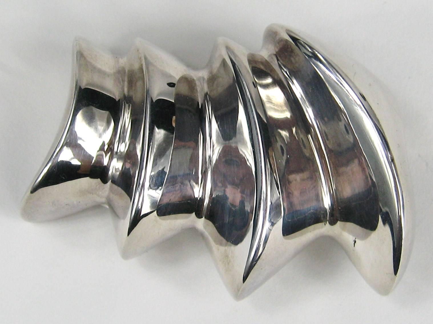 Modernist Sterling silver Brooch designed by Bayanihan. Triumph style clasp closure. Measuring  64.00mm or 2.50