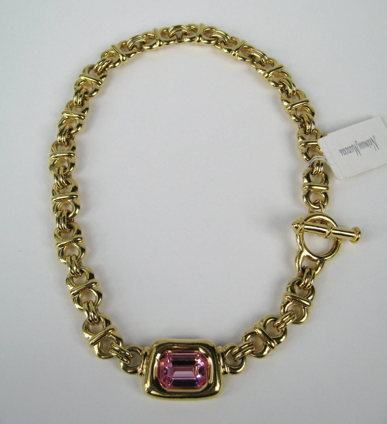 Large Pink Swarovski Crystal Necklace with toggle clasp. New Old Stock (never worn) Measures 18 inches  end to end Bezel measures  1.23 in x .92. This is out of a massive collection of Hopi, Zuni, Navajo, Southwestern, sterling silver, (costume
