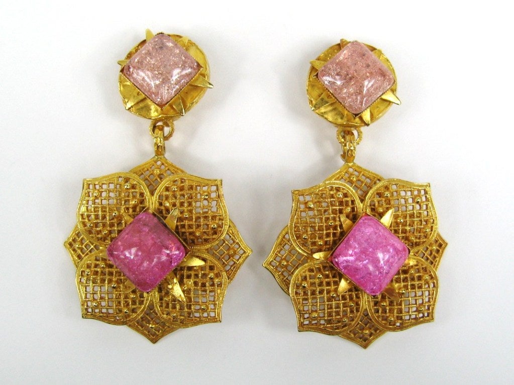 This is an exquisite pair of dangle earrings that demonstrates all that is so great about the designs of Philippe Ferrandis. Pale pink at the top and a vibrant pink poured glass bezel set in a floral motif. The matching necklace is listed as well on