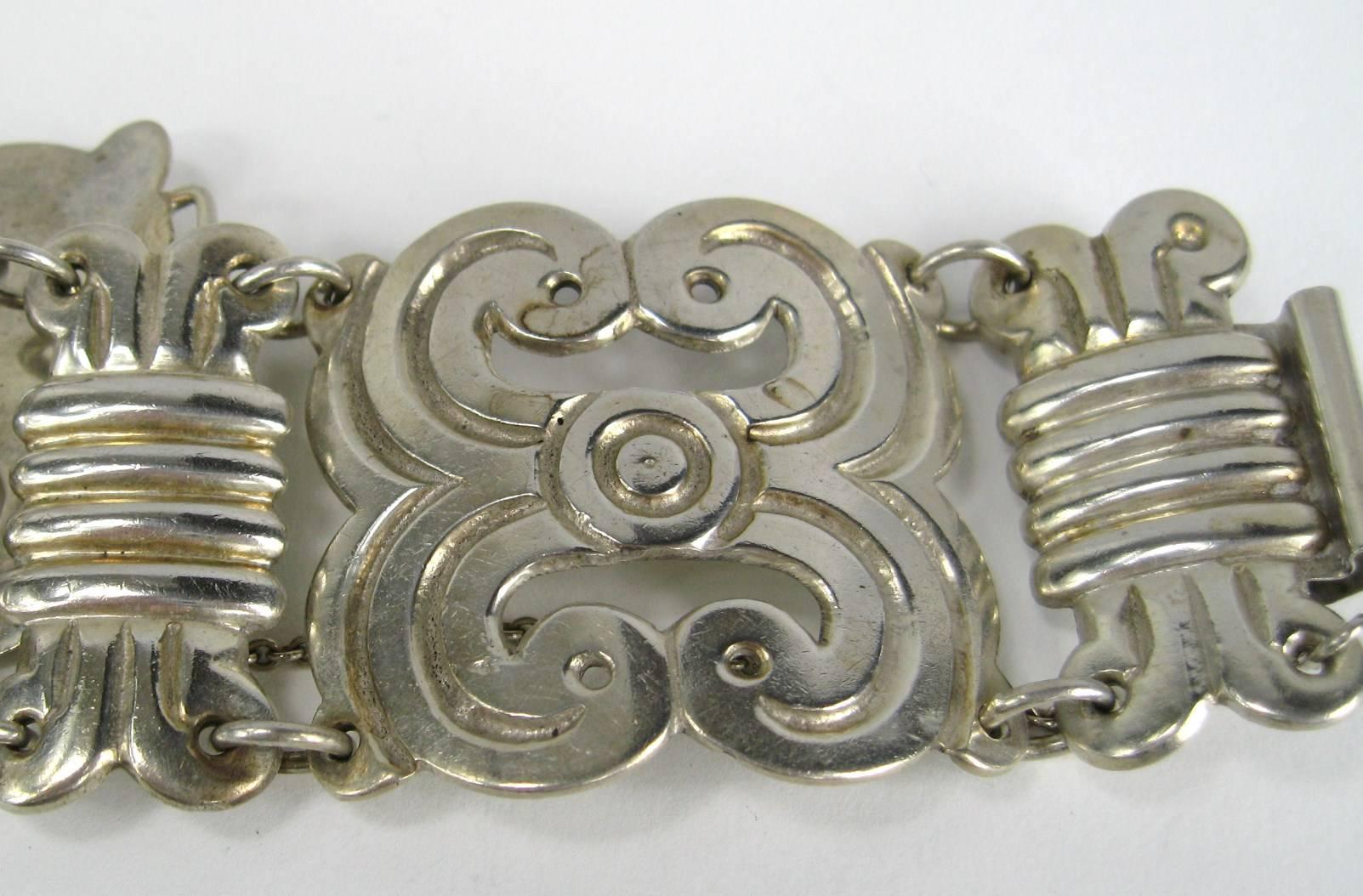 Stunning large paneled sterling silver bracelet. Hallmarked sterling / Mexico Safety chain affixed. Will fit up to a 6.5-inch wrist.  Panels are 1.45 inches wide. This is out of a massive collection of Hopi, Zuni, Navajo, Southwestern, sterling