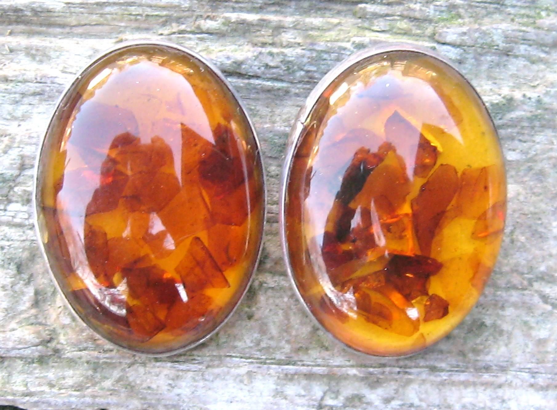 Large Handmade Baltic Amber Earrings. Clip On's. Measuring 1.60 inches x 1.19 inches.  Hallmarked on the back.  This is out of a massive collection of Hopi, Zuni, Navajo, Southwestern, sterling silver, (costume jewelry that was not worn)  and fine