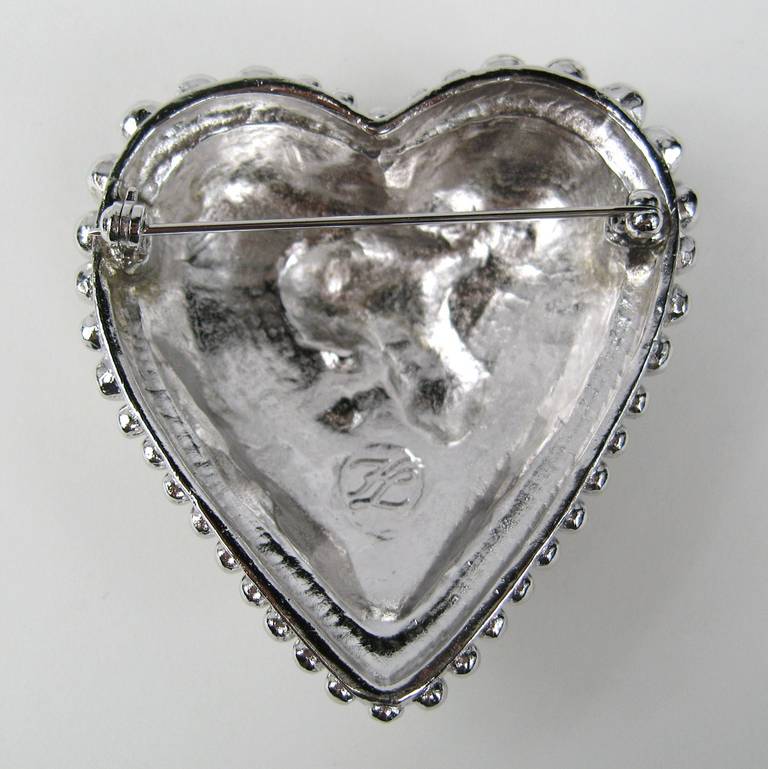 Karl Lagerfeld Silver Crystal Heart Brooch, made with the finest Swarovski crystals 2.23 inches top to bottom x 2.14 wide.  This is out of a massive collection of Hopi, Zuni, Navajo, Southwestern, sterling silver, (costume jewelry that was not worn)