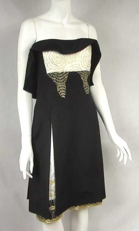 YSL 100% Cashmere Little Black Dress with oh so much detailing Spiderweb Gold Appliques. Double zippered back. Hidden pockets in the front. Will fit a small. Please be sure to check our storefront for more fashion as we have both Vintage and