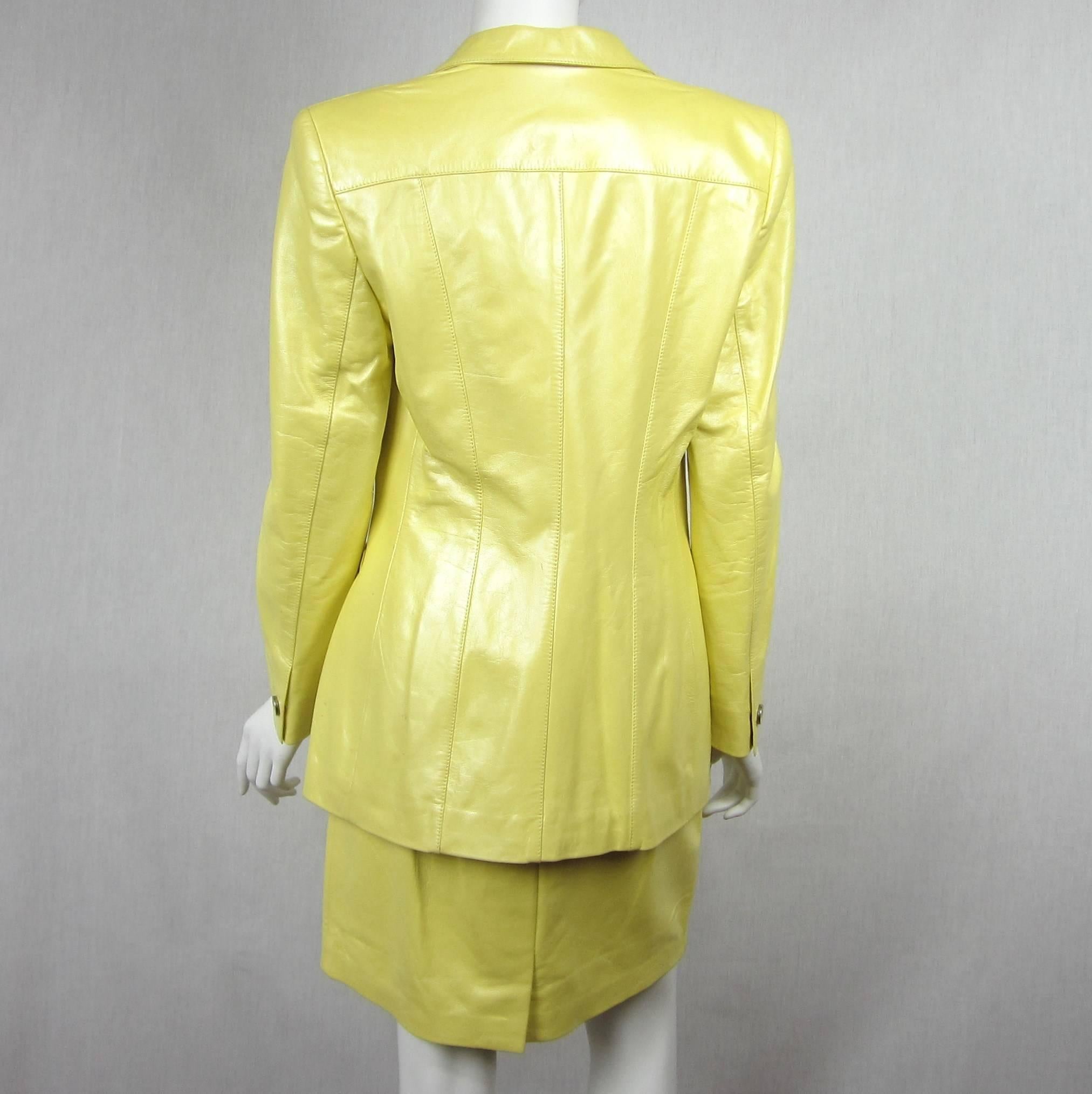 AMAZING SUIT in a more amazing color! Escada  NEW OLD STOCK Price tags still attached. Escada PEARL Yellow Leather Fitted Jacket and Skirt. Zippered skirt with slit pockets, kick pleat in the back. Great cut on this as well. The price of this was