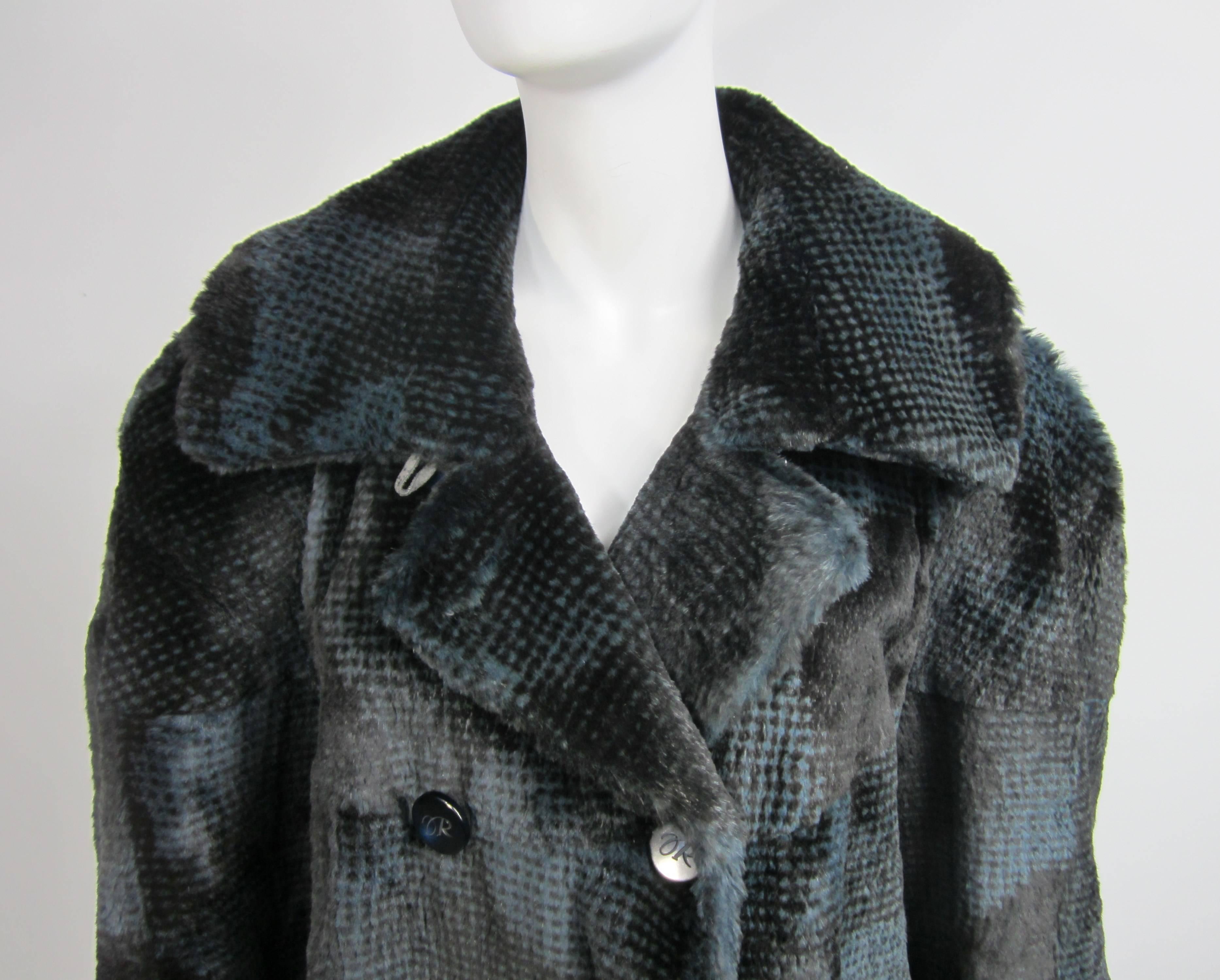 Stunning Blueish, Black and Gray Sheared Mink By Revillon of Paris. Fur is soft and supple. This coat is a pea coat style. The coats changes color in the light, see photos. Have Large  R's on Buttons and inside on the lining. Over sized large