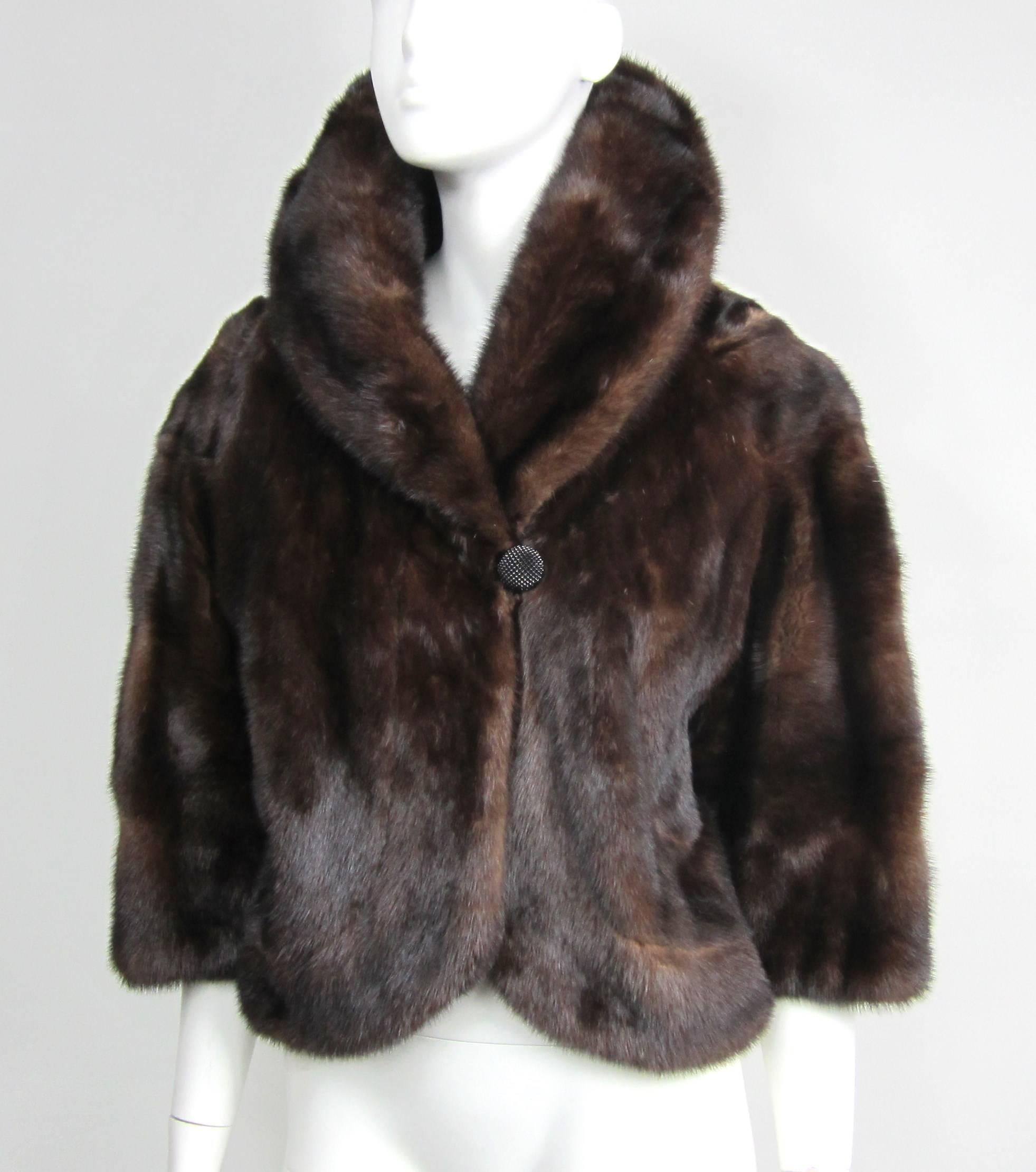 Vintage Deep Chocolate Brown Mink Shrug Jacket Bolero. Soft and supple with no issues. Will fit a medium . Measuring up to 36-inch chest with a 6-inch collar, Length is 21 inches down the back. 3/4 bracelet sleeves. No monogram. One button closure.