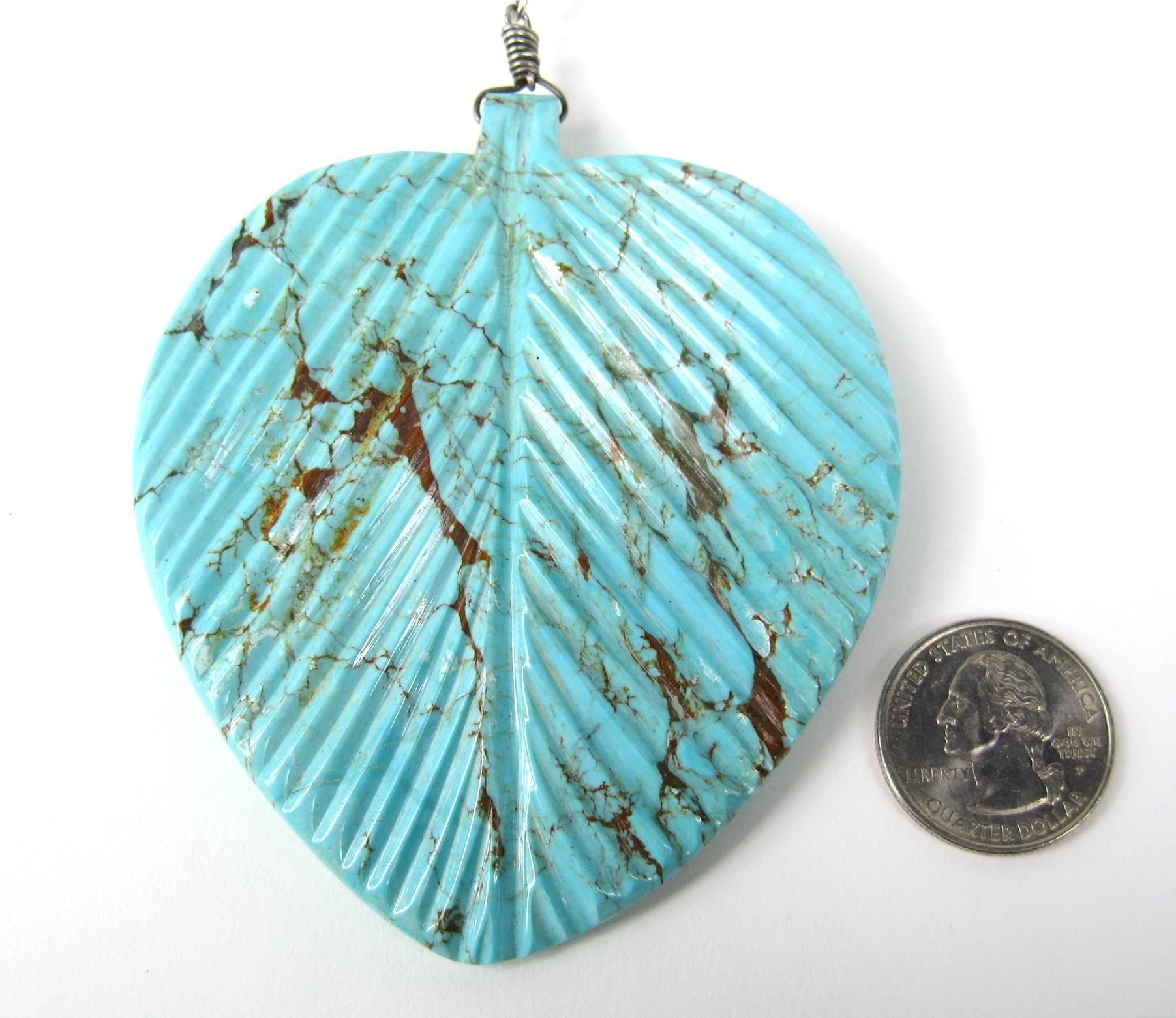 Stunning Massive Turquoise Rondelle with Sterling Insets each signed by American Indian Artisan  WAYNE AGUILAR, one of the finest silversmiths-jewelers from the SANTO DOMINGO KEWA PUEBLO. Massive Carved Turquoise Leaf Sterling Silver. Measuring 3 in
