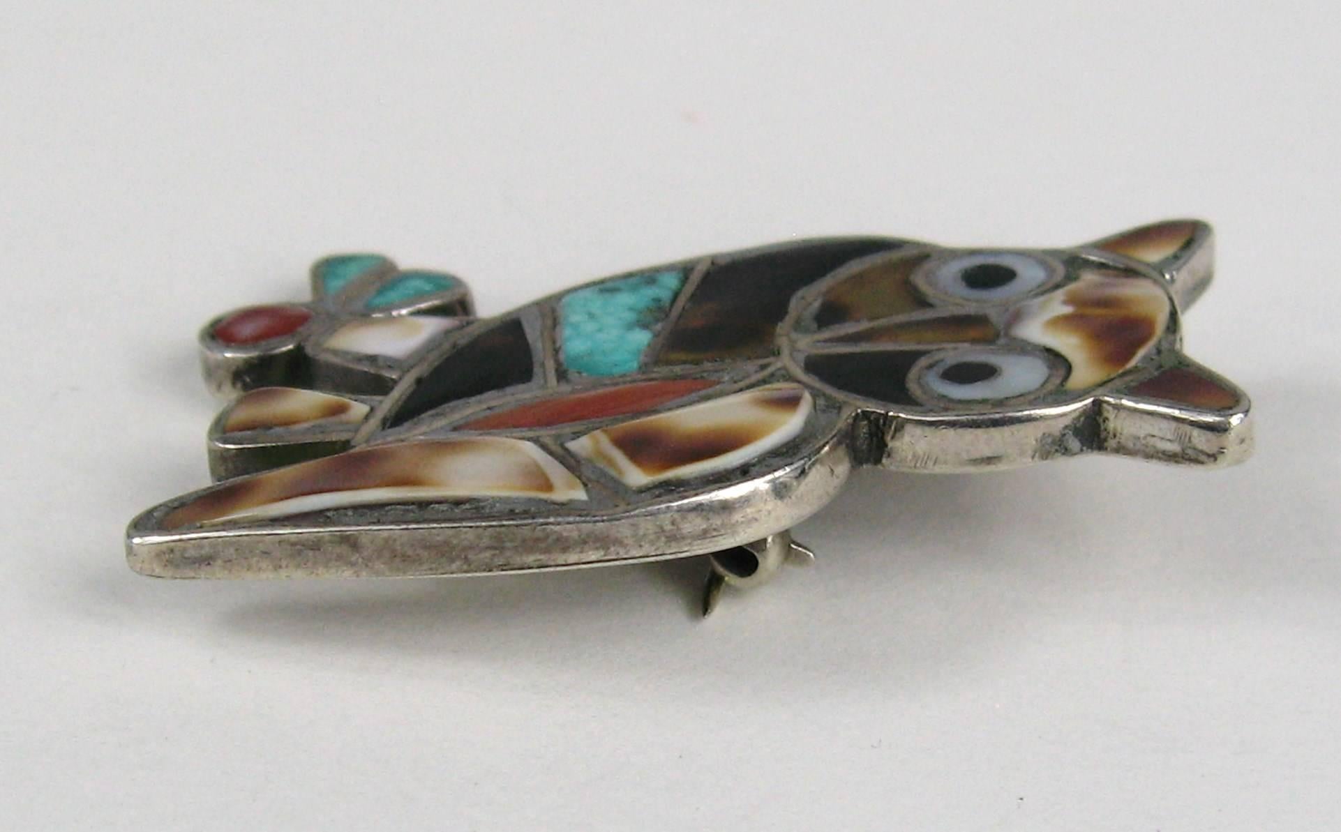 A stunning example of Native American workmanship on this inlaid Zuni Pin. Out of a massive collection of Navajo, Zuni, Hopi and Southwestern Jewelry 
The brooch is Pawn, purchased out west in the early 1970s and 1980s. This measures 1.7 inches x