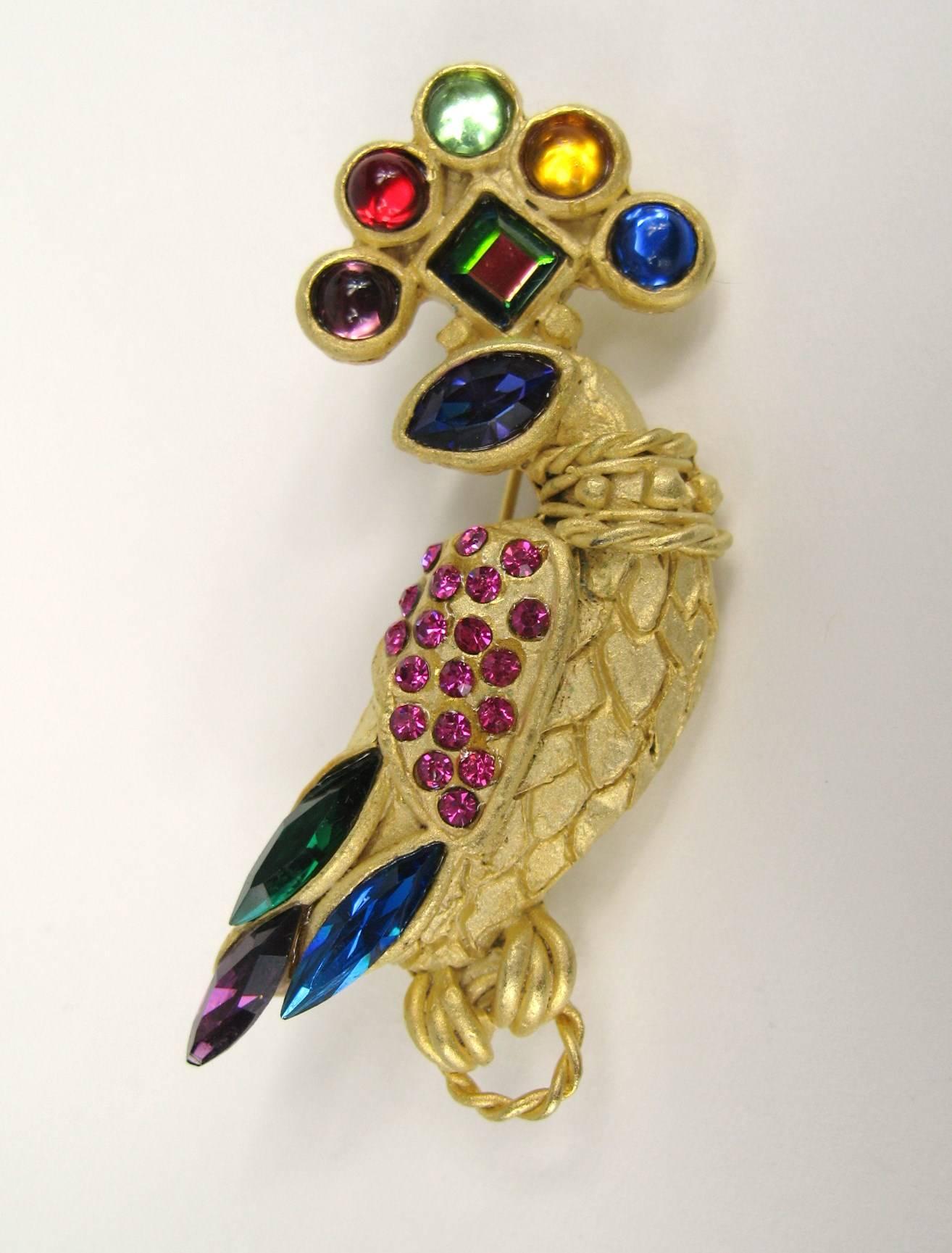 Another piece out of a massive collection of costume jewelry Peacock Brooch that has Bezel Cabochons as well as faceted cut crystals on the headdress and body of this one.  Measuring 2.65in.   x 1.04in.  This is out of a massive collection of Hopi,