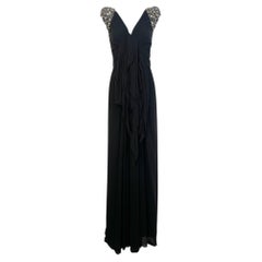 Elie Saab, Frühjahrskollektion 2010: Schwarzes Seidenkleid mit gold- und silberverzierten Schultern