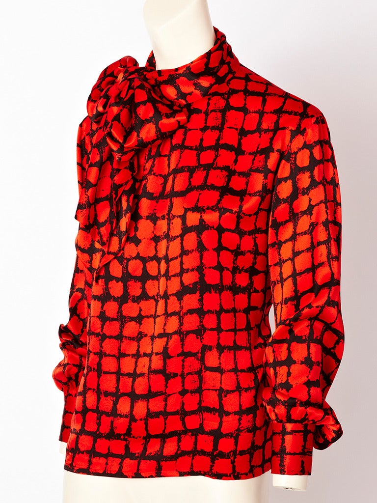 Yves Saint Laurent, red and black, painterly, patterned blouse with generous side bow closure.