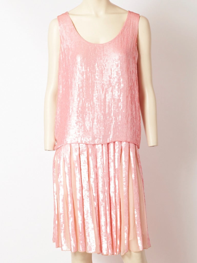 Bill Blass, soft pink, sequined tank top and paneled skirt, cocktail ensemble.
Skirt has panels of vertical sequins alternating with panels of chiffon creating
a pleated affect.