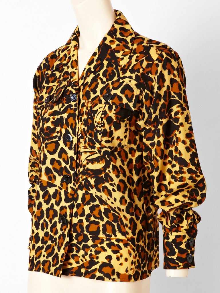 Yves Saint Laurent, wool challis, leopard print blouse with notched collar and 
safari style, breast pockets.