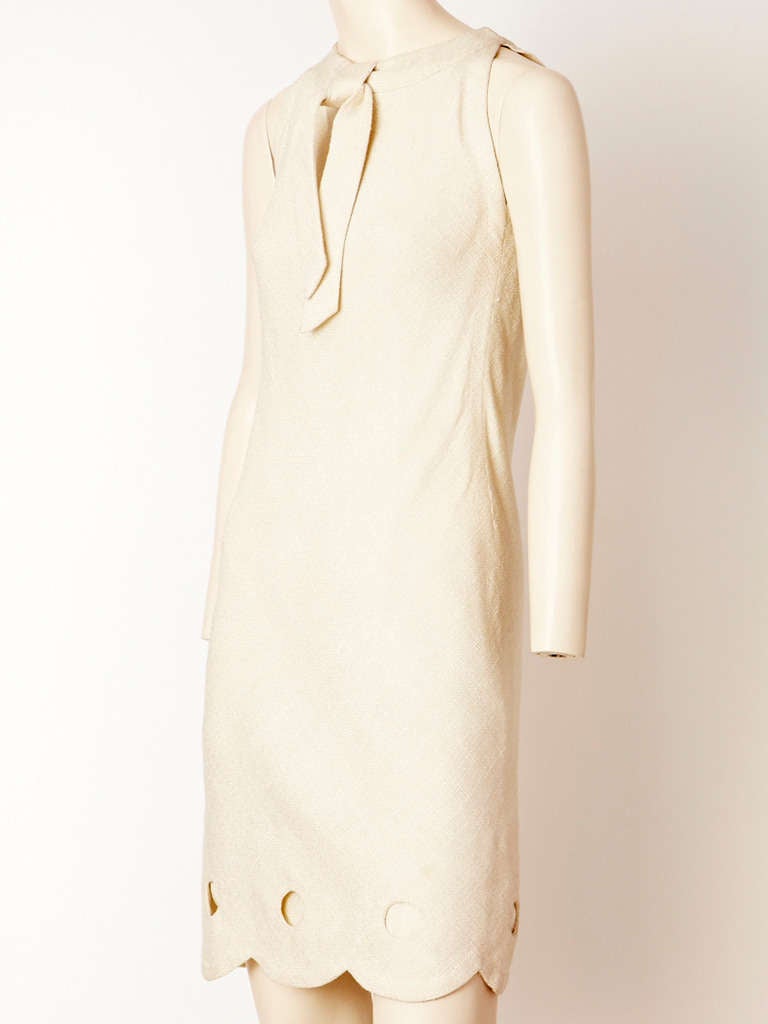 Pierre Cardin, linen blend, bias cut, shift, day dress with tie at the neck and scalloped hem detail. C. 1960's.