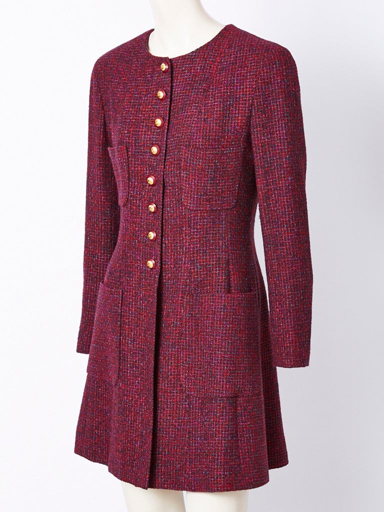 Chanel, raspberry, tweed fitted, coat/ jacket, having no collar, back vent, breast and hip pockets.