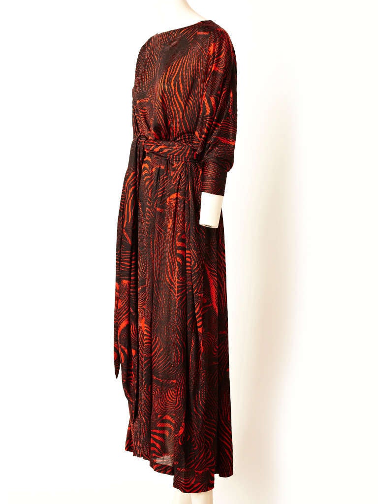 Missoni, terra cotta and black abstract print, silk knit tent dress with sash and dolman sleeve detail.