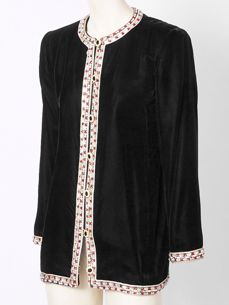 Yves Saint Laurent, black velvet, evening cardigan with jeweled trim and buttons.