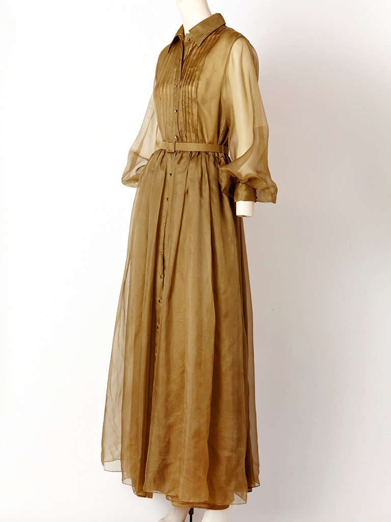 John Anthony, taupe,  belted, organza shirt dress/gown with pin tucks on the bodice and sheer organza full sleeves.. Rhinestone buttons all the way down the front and full gathered skirt.