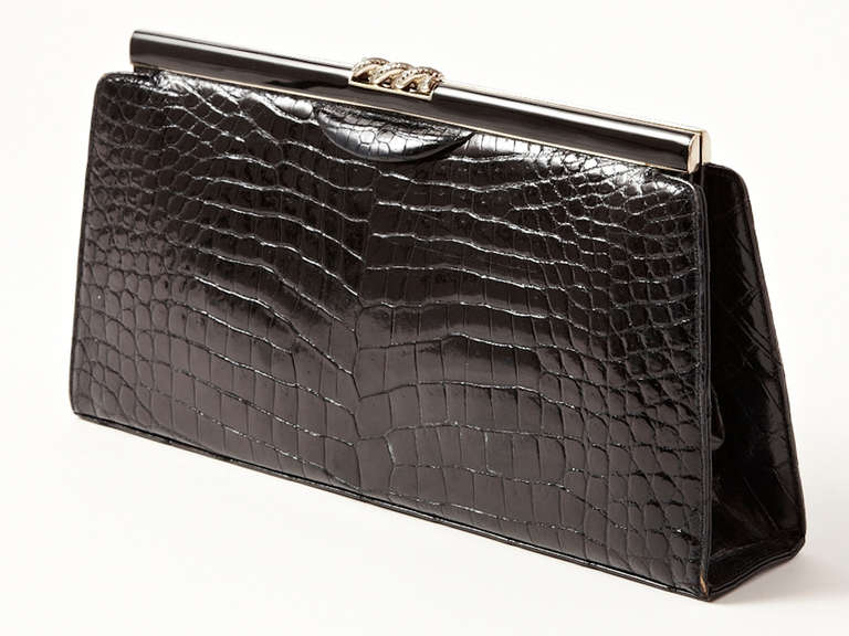 Lucille de Paris, black, crocodile clutch with enamel and marcacite clasp.