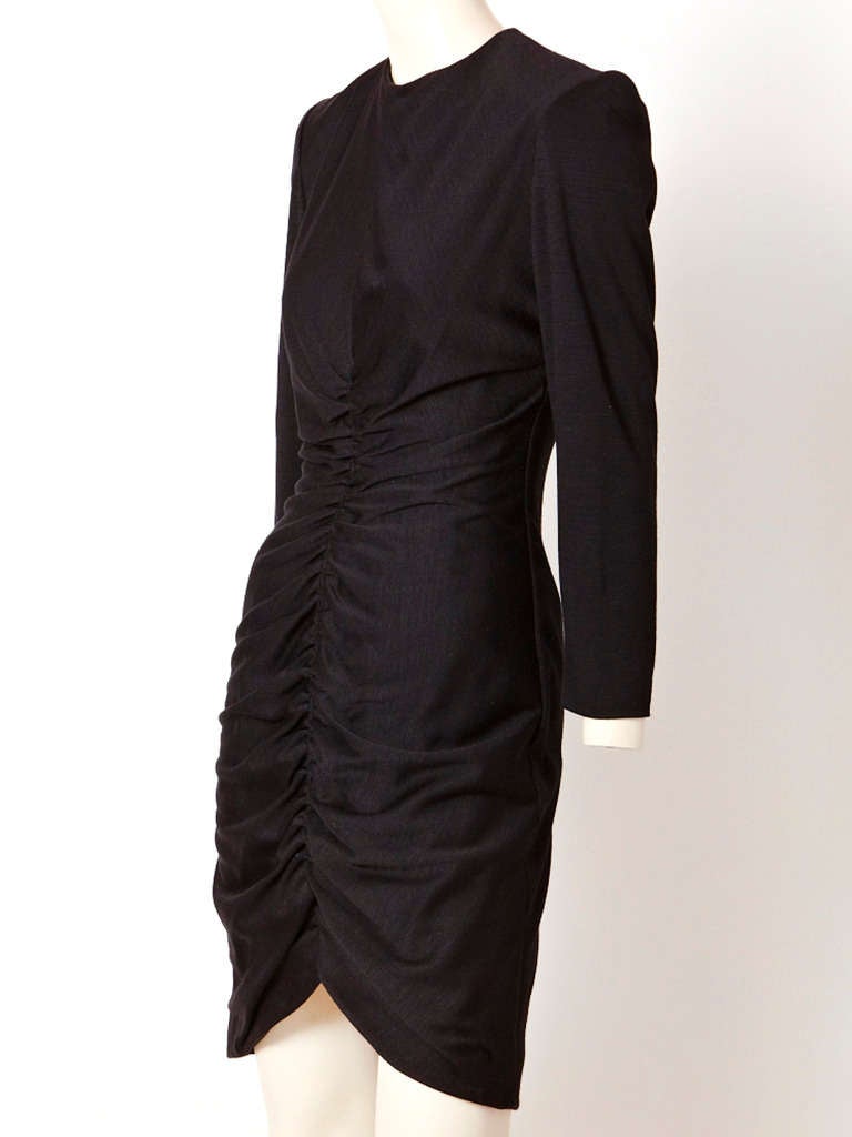 Jean Louis Scherrer, wool, cocktail dress with long sleeves and jeweled neckline and shirring detail up the middle front of the dress.