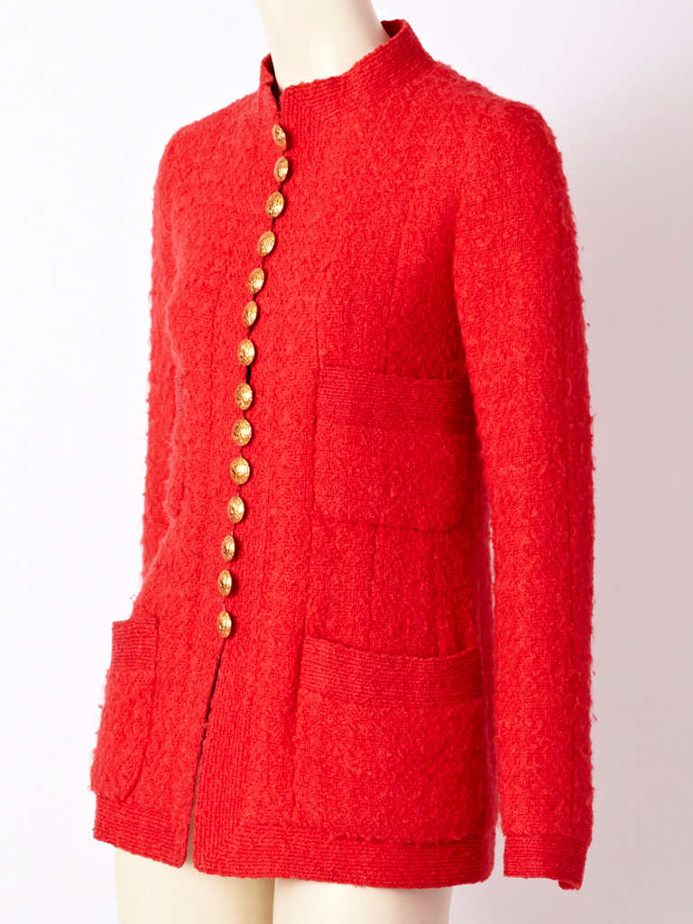 Chanel, couture, coral tone, Lessage tweed fitted jacket. jacket has signature Chanel pockets... two under the bust, and two at the hips....Mandarin collar with gold buttons that have loop closures... C. 1990's