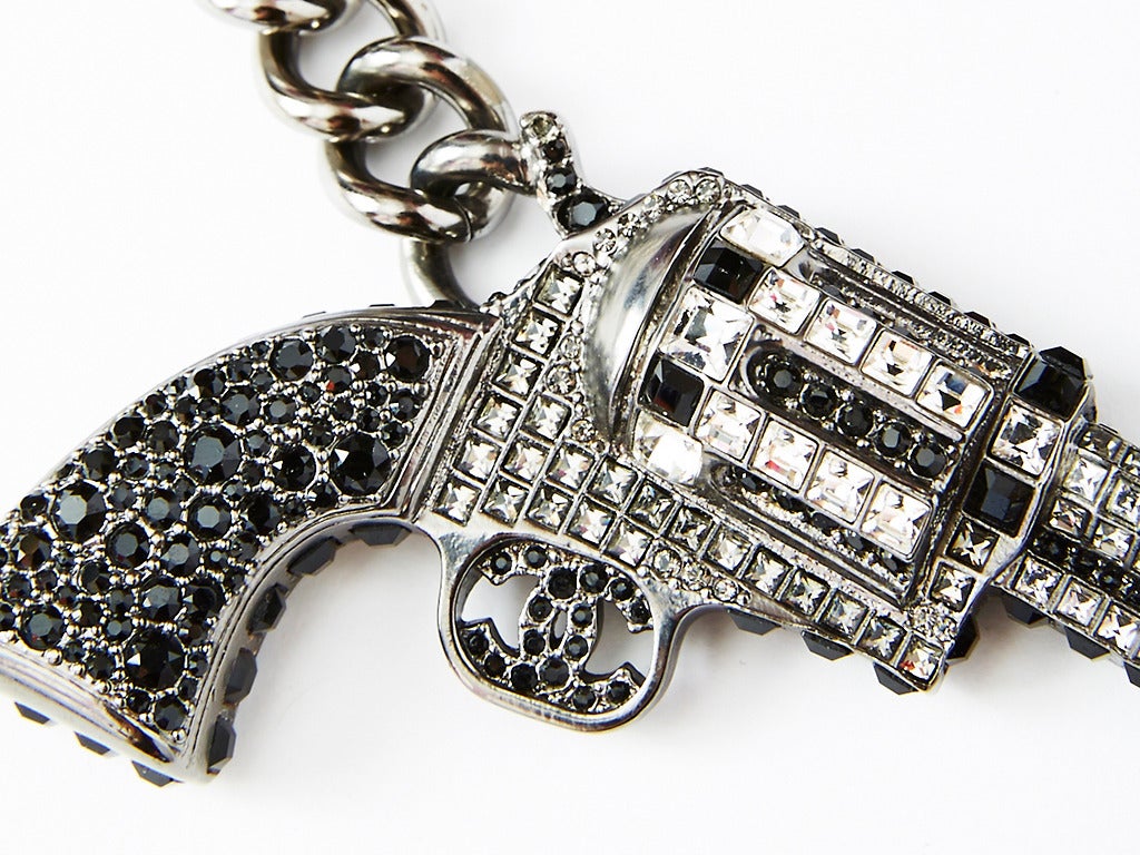 Sold at Auction: Chanel Runway Convertible Pistol Necklace / Belt