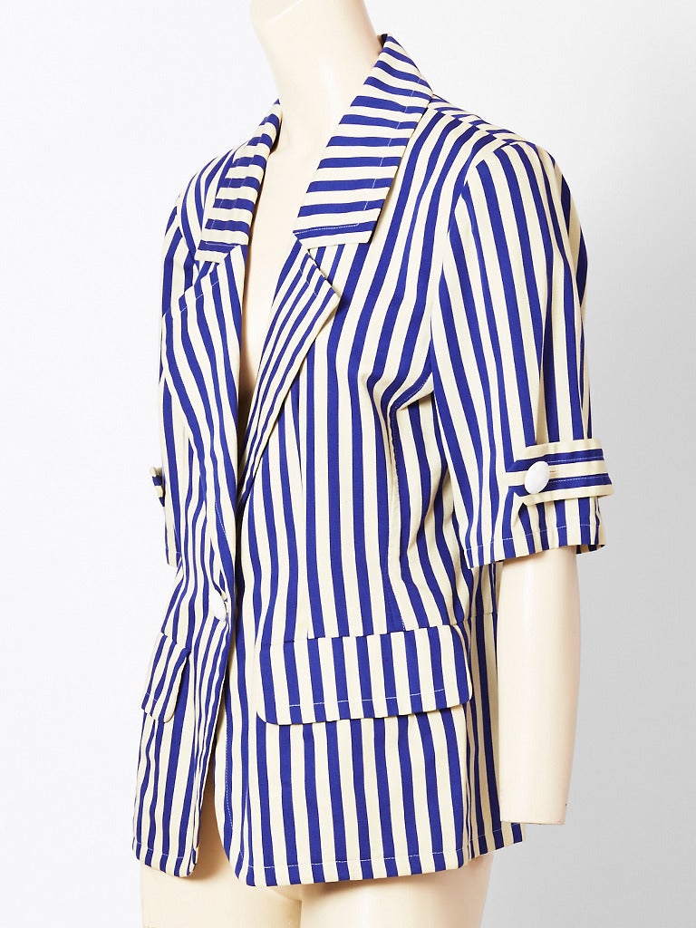 Yves Saint Laurent, navy and white stripe fitted jacket having a one button closure and flap pockets. Sleeves end at elbows.