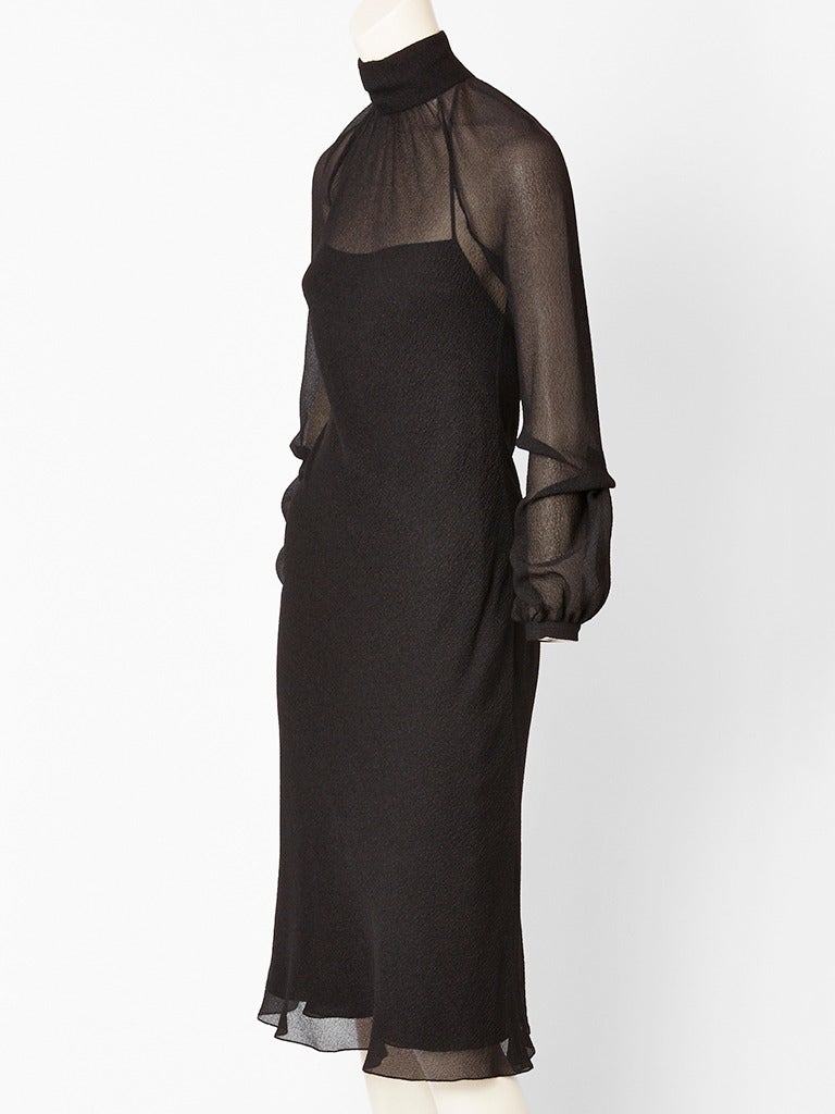 Martin Margiela, for Hermes, high neck, bias cut chiffon dress with an underpinning, that is also bias cut that can be worn by itself. Dress is made of a sheer silk crepe and has long full,sleeves that cuff at the wrist. Underpinning has thins