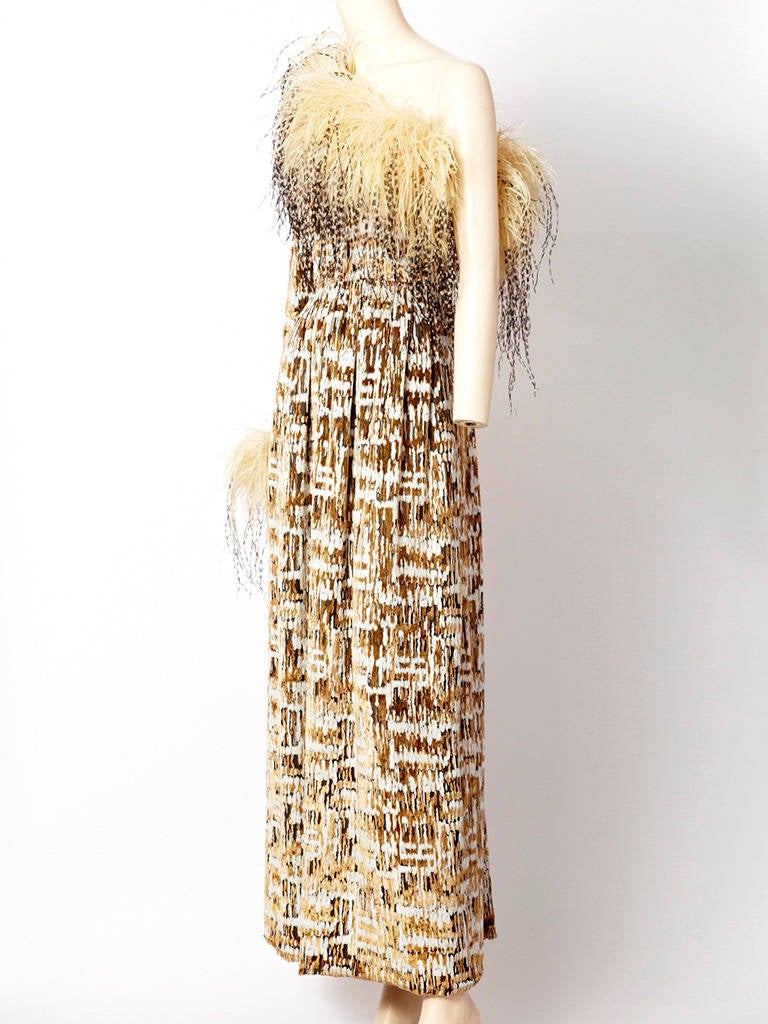 Bill Blass - cut velvet one shoulder gown with ostrich feather detail .