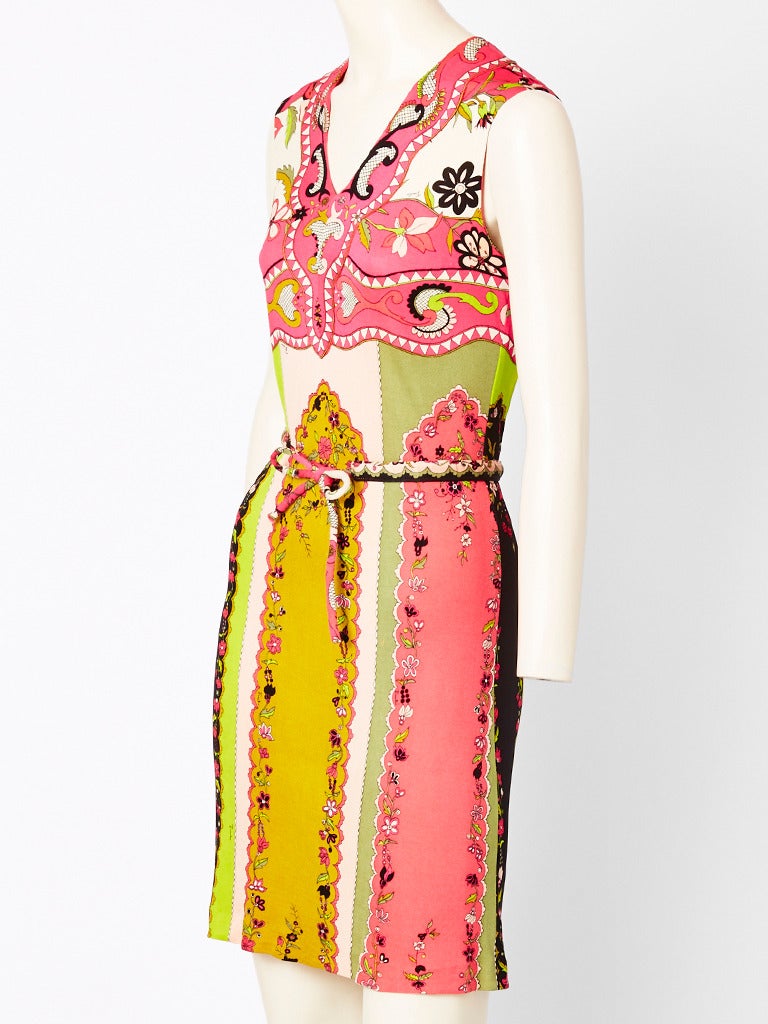 Pucci, colorful, patterned, silk knit, shift dress with v neckline and matching, leather lined belt having tubular ties. Lovely shades of pinks, greens and mustard. Please note that the dress is marked size 10. It is an 