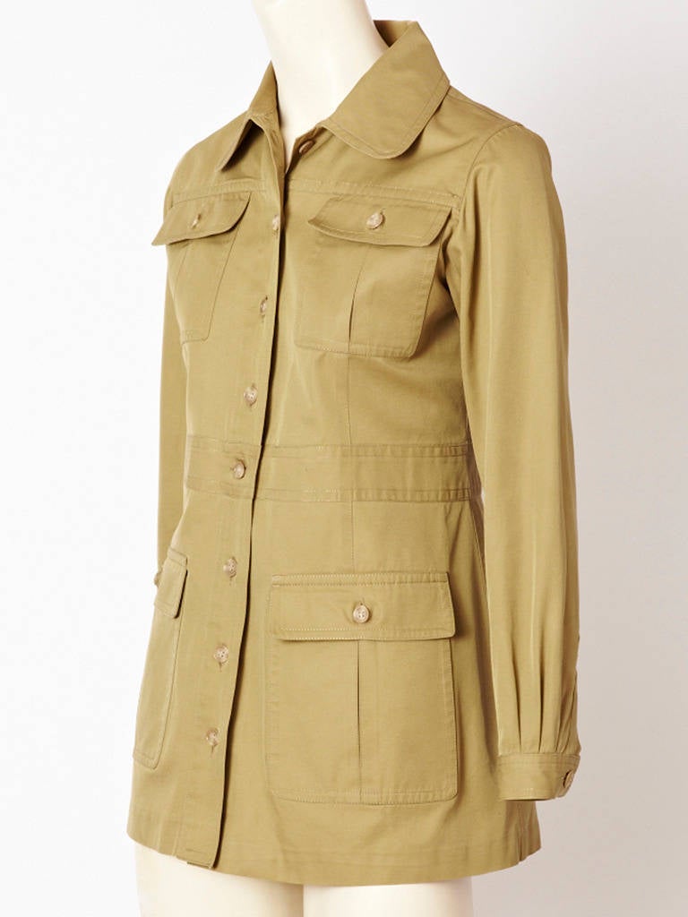 Yves Saint Laurent, iconic, khaki,fitted, safari jacket with breast and hip pocket detail.