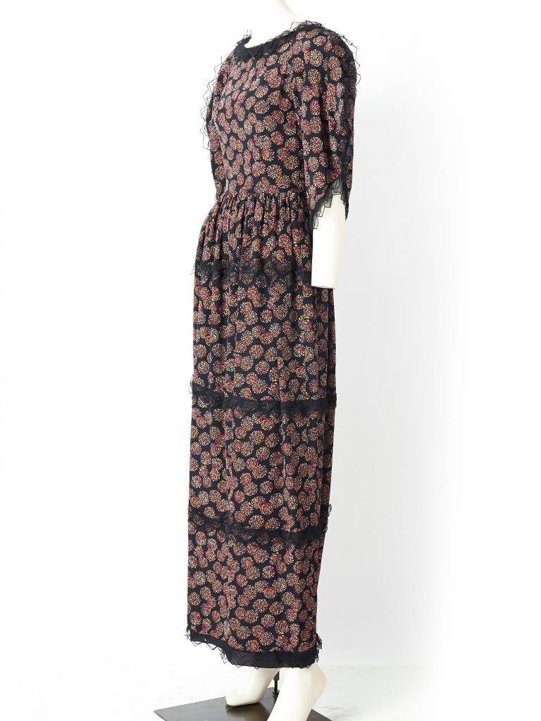 Karl Lagerfeld for Chloe, printed silk, maxi  dress with lace detail on sleeve, skirt, and neckline. Puff 3/4 sleeves. C. 1970's.