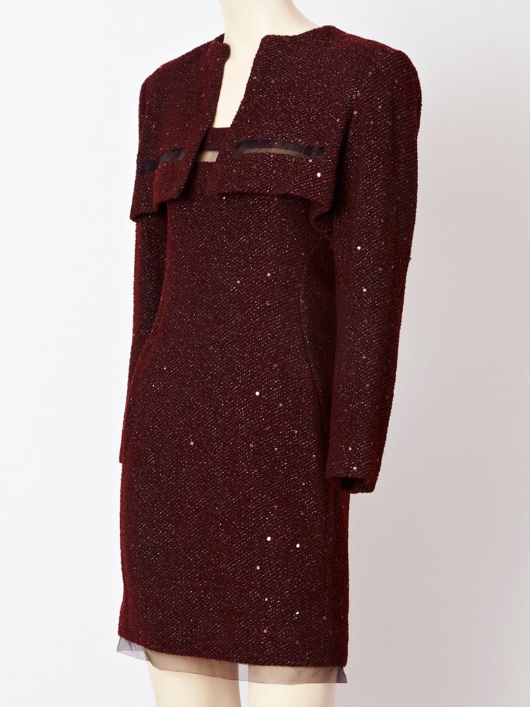 Geoffrey Beene, deep bordeaux color,  wool, lurex, tweed slip dress with matching bolero.
Dress and bolero are embellished with tiny subtle same shade sequins.Fitted dress has sheer straps and a horizontal sheer strip detail above the bust and