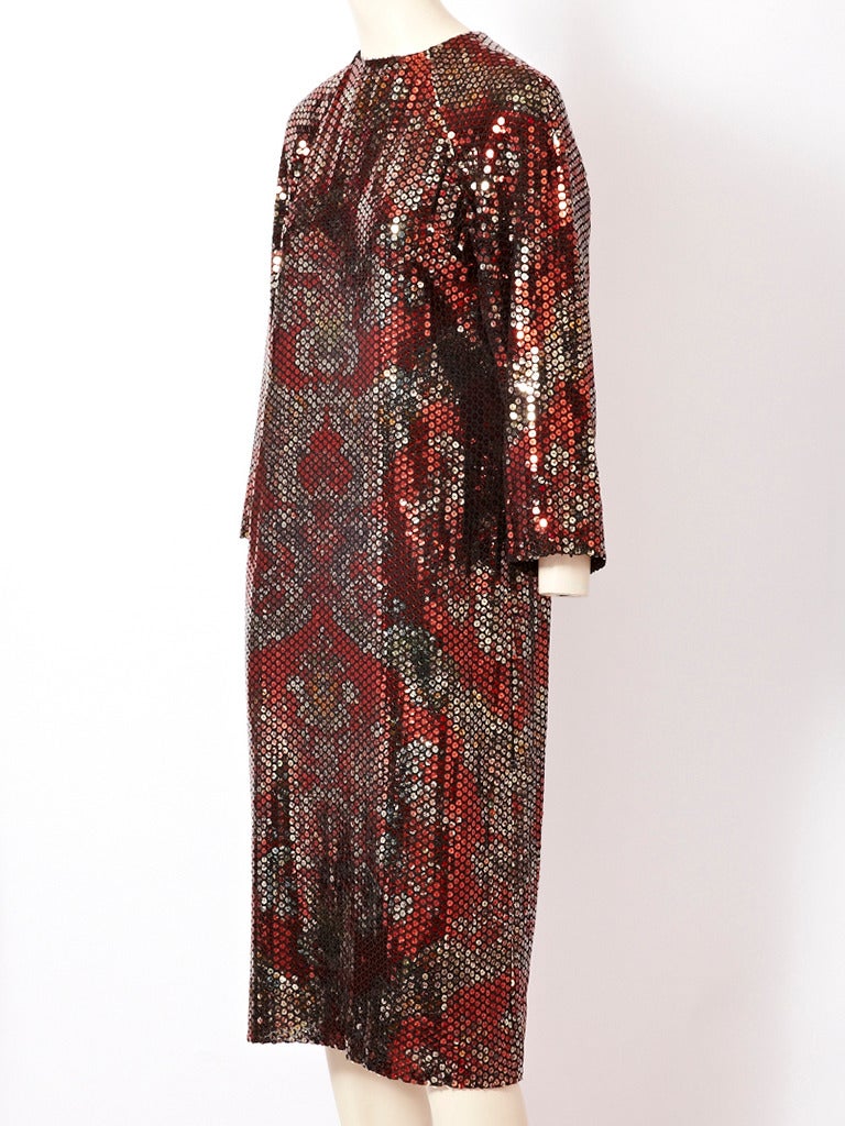 Chanel. copper and bronze toned, sequined, raglan sleeve, shift, cocktail dress.
The 2 toned sequins create subtle, medallion type patterns, placed on the body of the dress.
