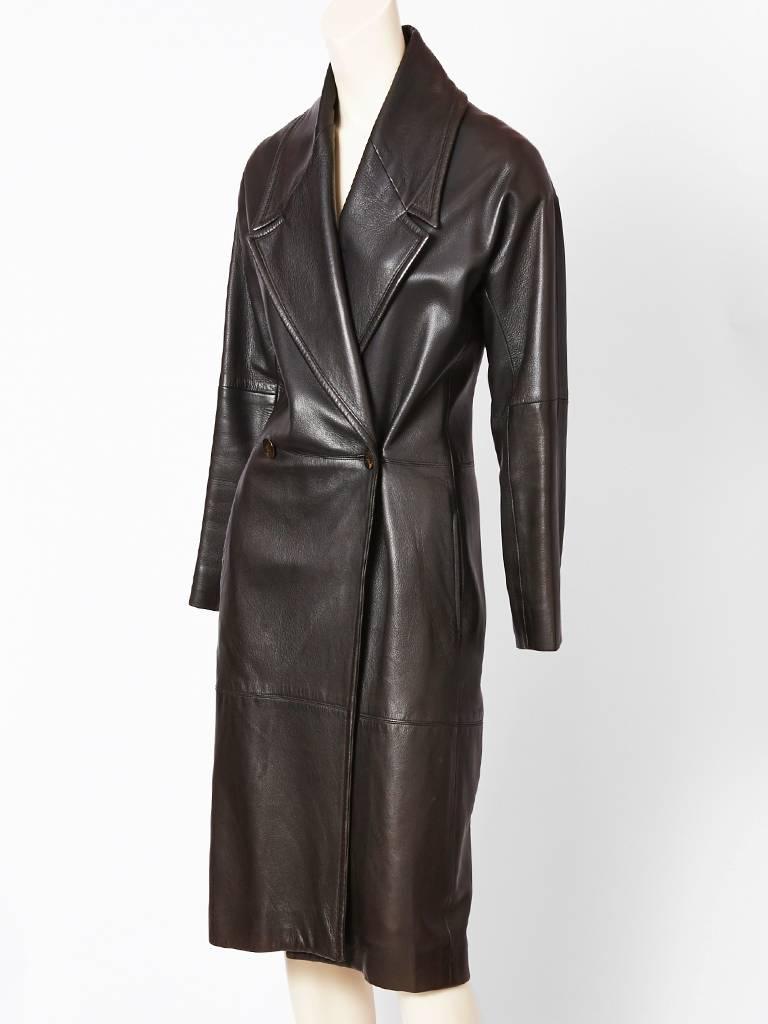 Ronaldus Shamask , narrow silhouette, black soft Italian leather, coat with a raglan sleeve, wide lapels and single button side closure.