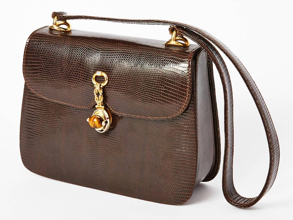 Gucci:: braune Eidechse:: Umhängetasche mit goldenen Beschlägen und Tigerauge:: Verschluss. Innen aus Leder.