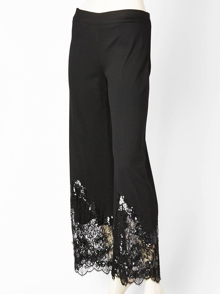 Valentino, flat front, wool jersey, wide pant, with lace, black sequin and beaded detail towards the end lf the leg.