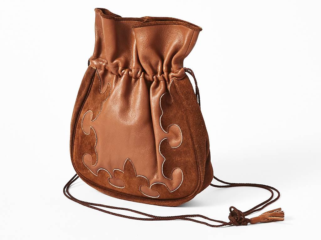 Yves Saint Laurnet, suede and leather drawstring bag, c. 1970's.