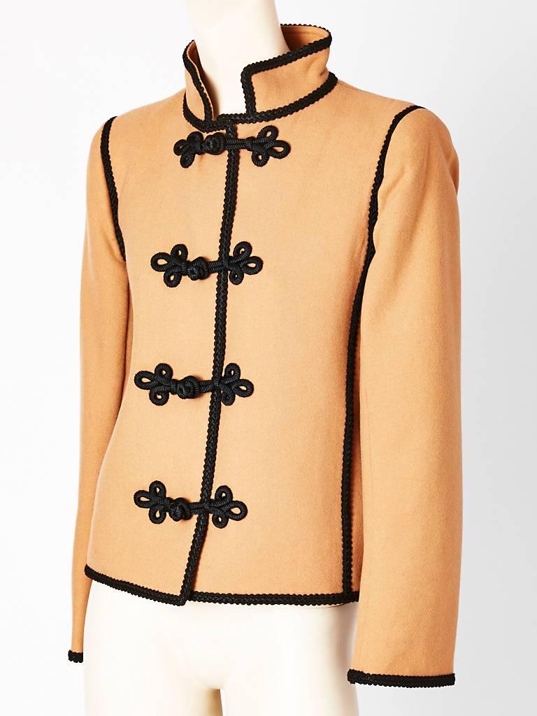 Yves Saint Laurent, Russian Colletion, camel tone wool jacket with black 
Passementerie,  detail.  Jacket ends just at the hip. Sleeves are slightly 