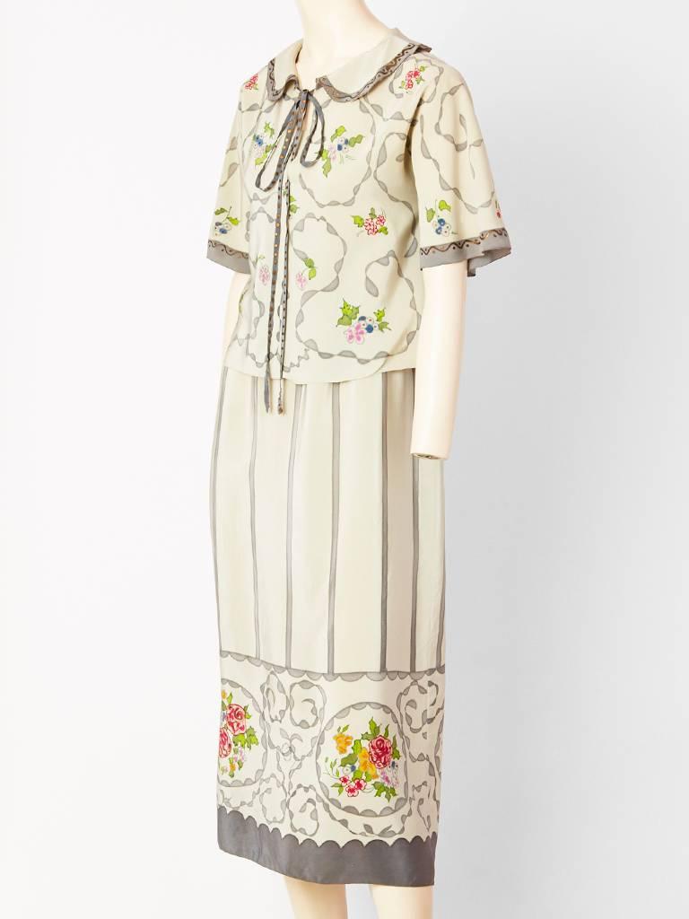 Karl Lagerfeld for Chloe, pale, grey, printed silk, chemise dress with cropped
overtop. Dress has a narrow silhouette having  a maxi length. It has a slip like 
bodice. Over blouse is cropped with a rounded collar and long tie. There is hand