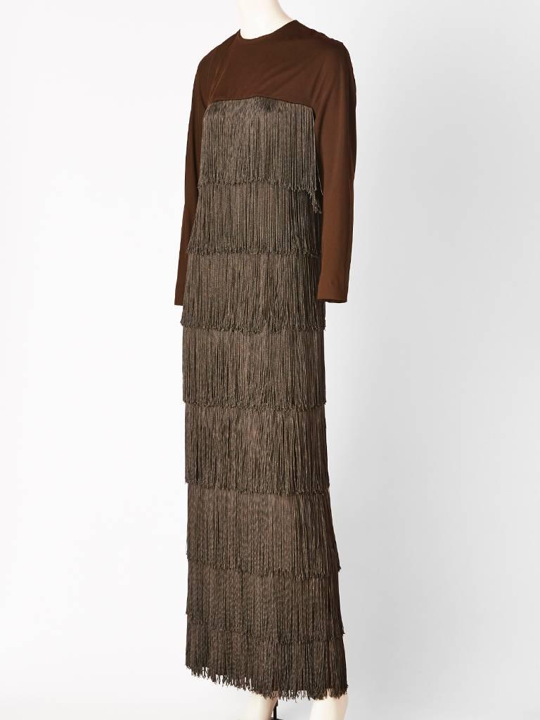 Chocolate Brown, Matte, jersey, long sleeve gown with long tiered fringe
Body is slightly fitted. Attributed to Bill Blass.