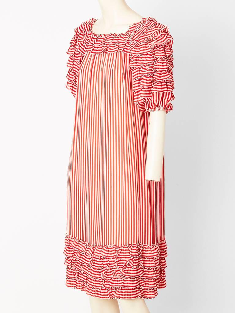 Guy Laroche, red and white, stripe chiffon, chemise style dress with ruffle detail
across the neckline, shoulders, sleeves and hem.