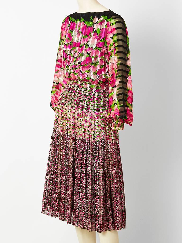 Uli Richter, pink and black, floral, silk chiffon, ensemble. Top is doubled in chiffon, having a boat neck, with sheer full sleeves that cuff at the wrist. Buttons down the back with covered buttons. Skirt has a dropped fitted waist with soft pleats